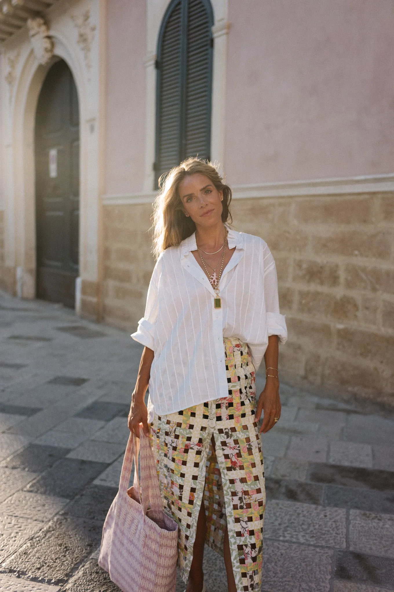 white blouse pastel woven skirt