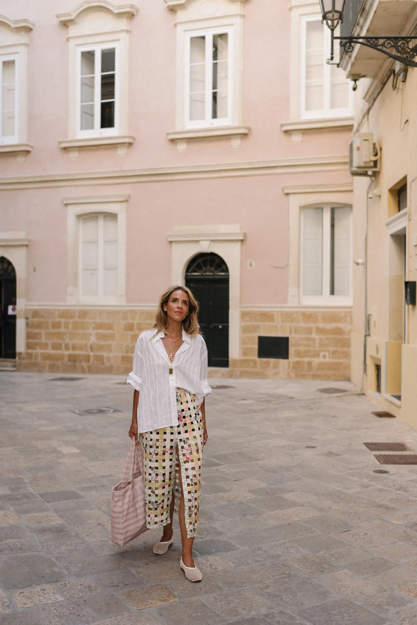 white blouse pastel woven skirt