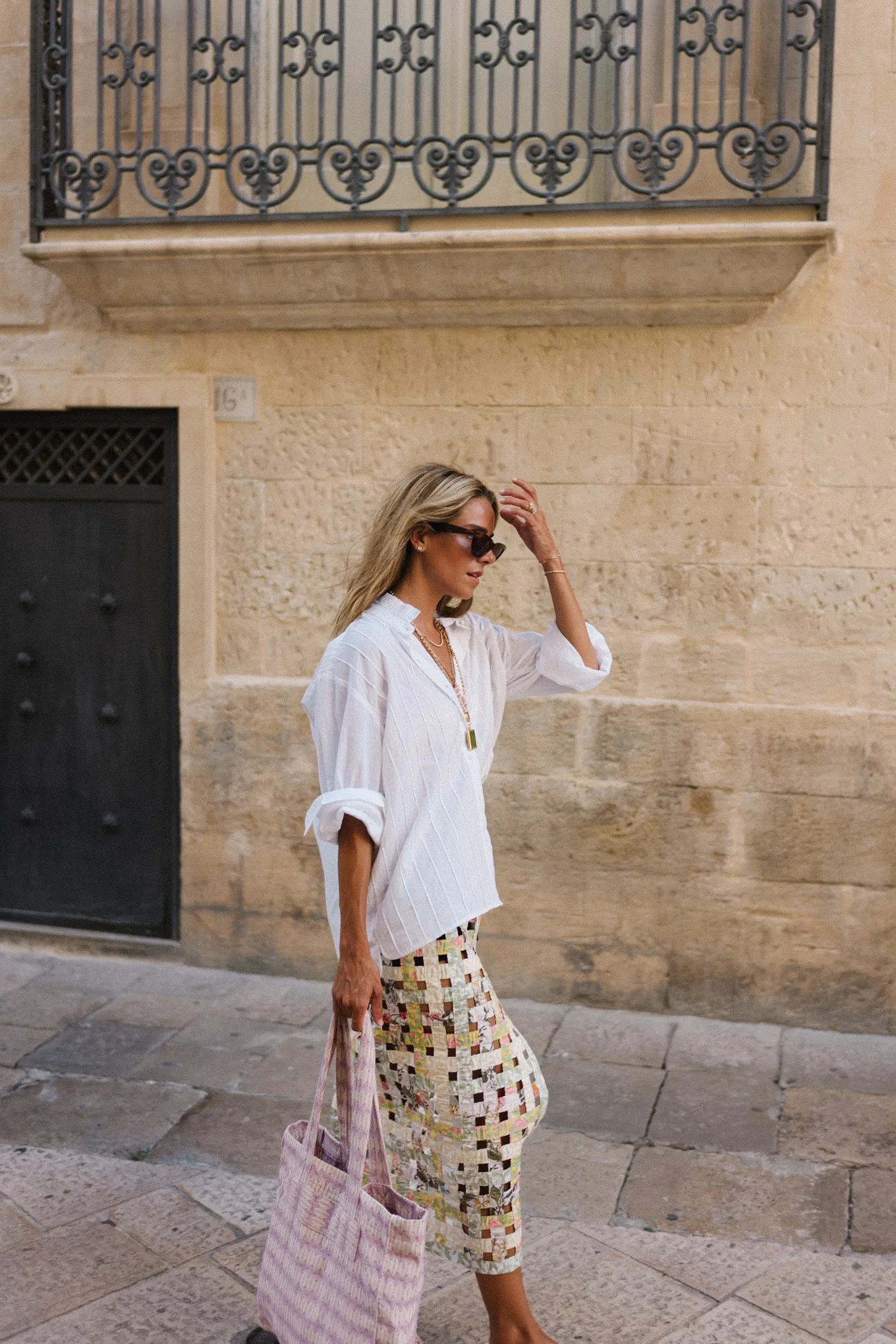 white blouse pastel woven skirt