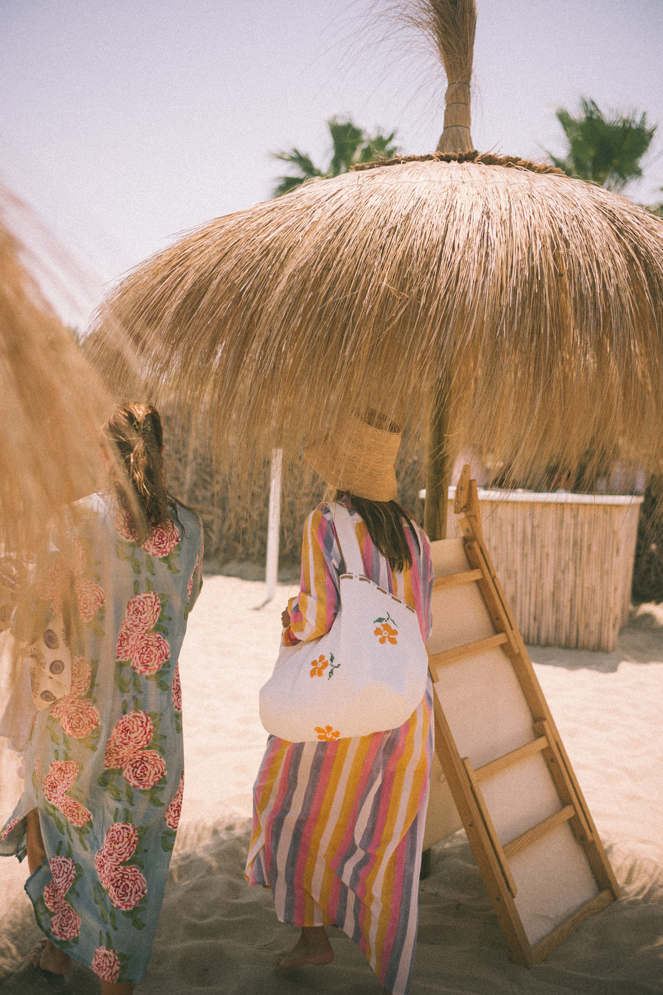 pink purple stripe coverup straw bucket hat white sunnies