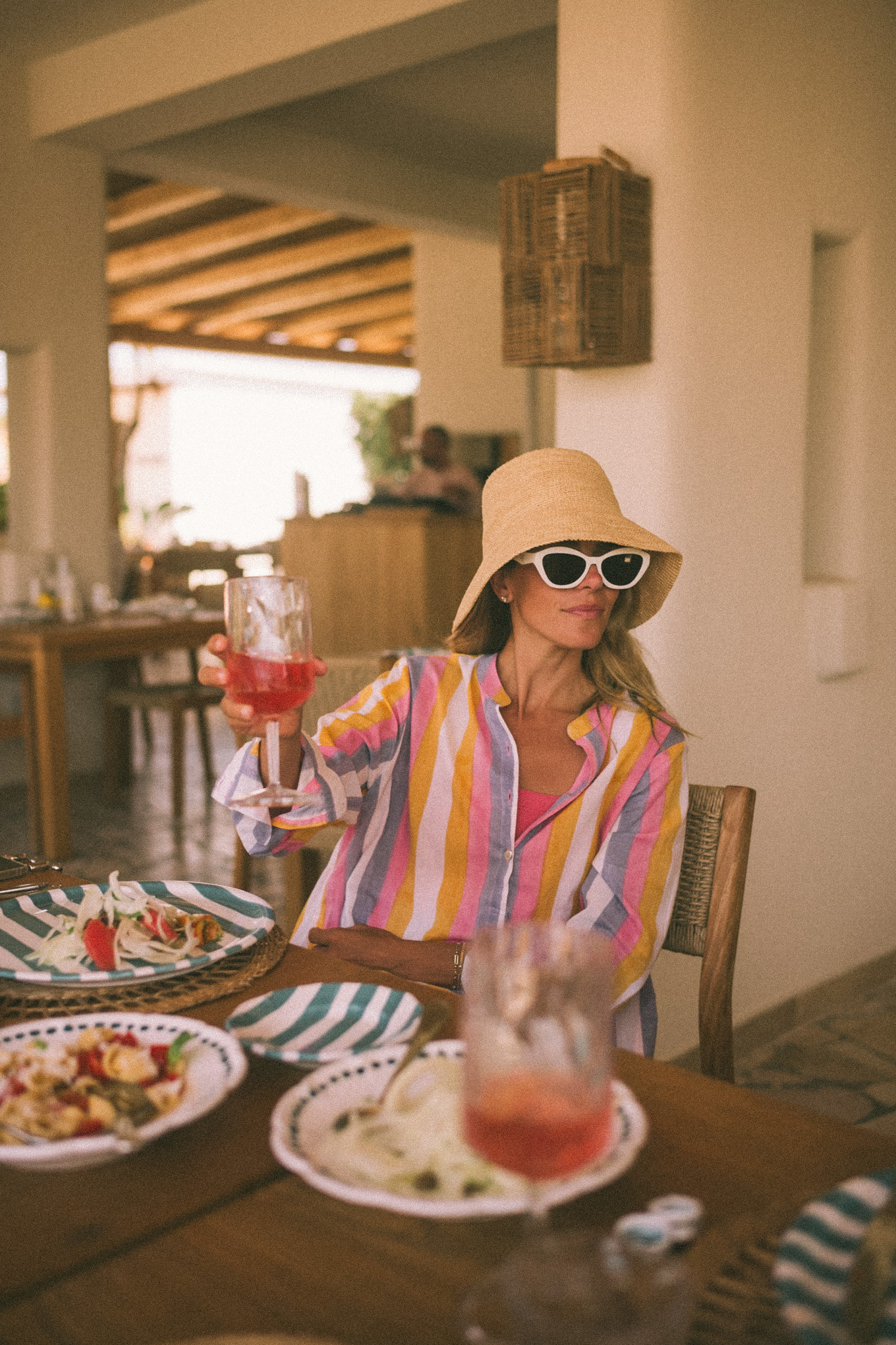 pink purple stripe coverup straw bucket hat white sunnies