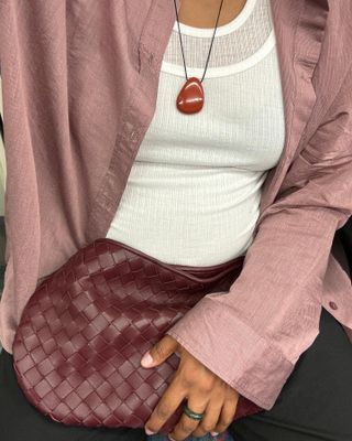 Influencer wearing stone jewelry.