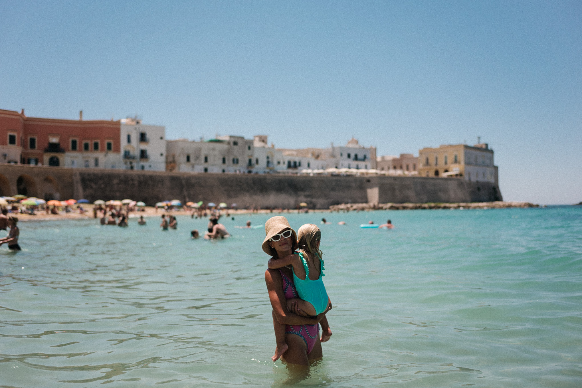 gallipoli puglia pink swimsuit straw bucket hat