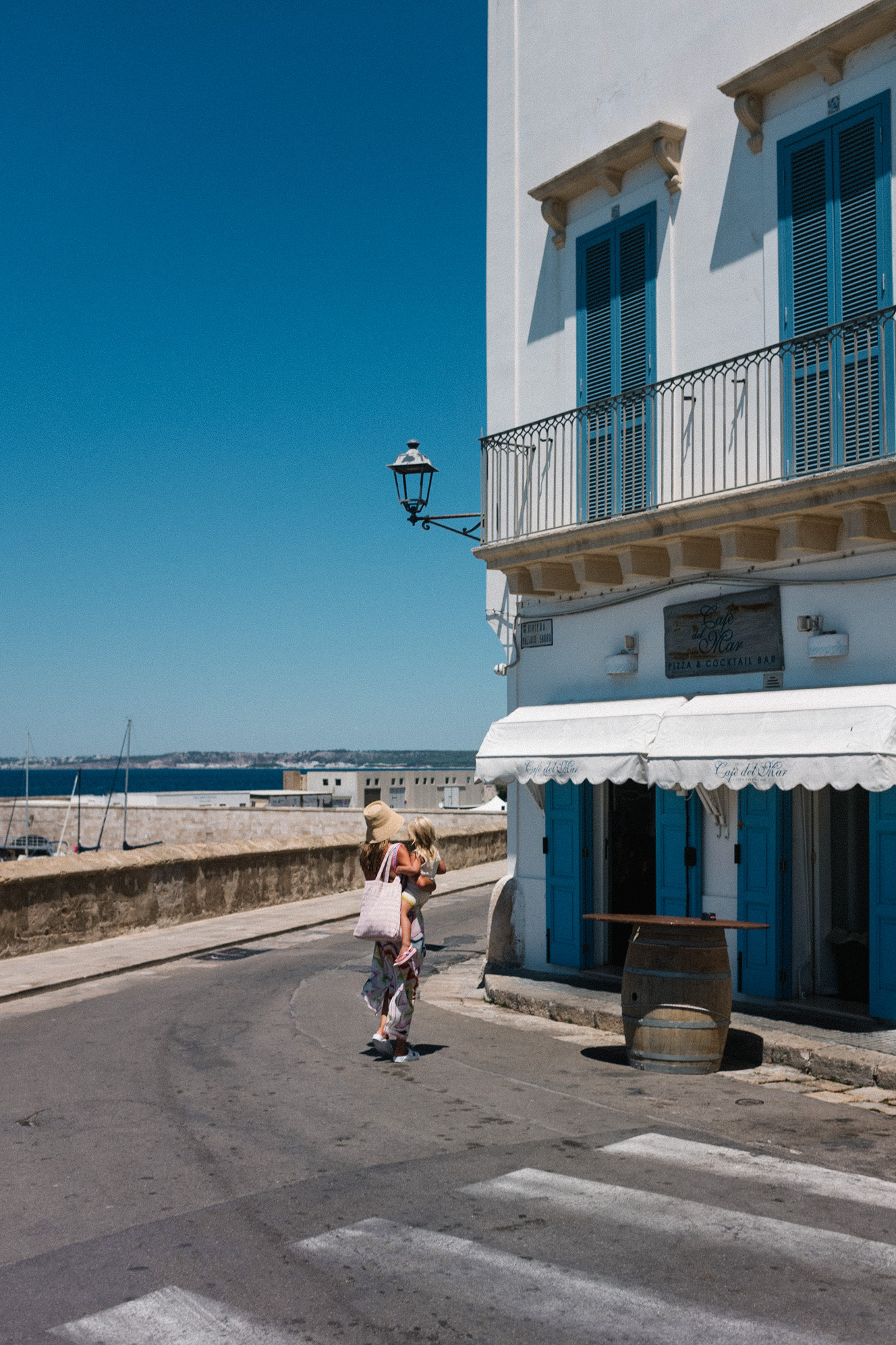 gallipoli puglia blue white striped sundress straw bucket hat