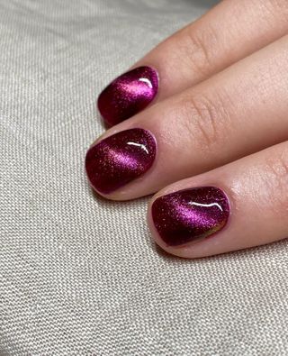 Purple cat eye nails