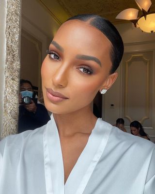 Jasmine Tookes wearing wedding makeup.