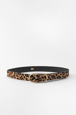 Belt Made of Printed Leather With a Width of 1.2 Inches (3 Cm). Oval Metal Buckle.