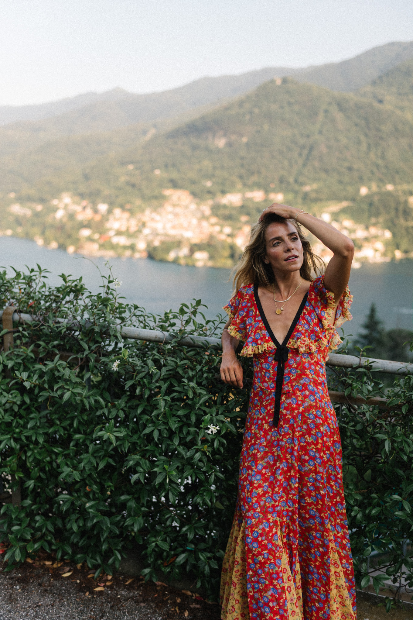 lake como italy red yellow blue floral dress