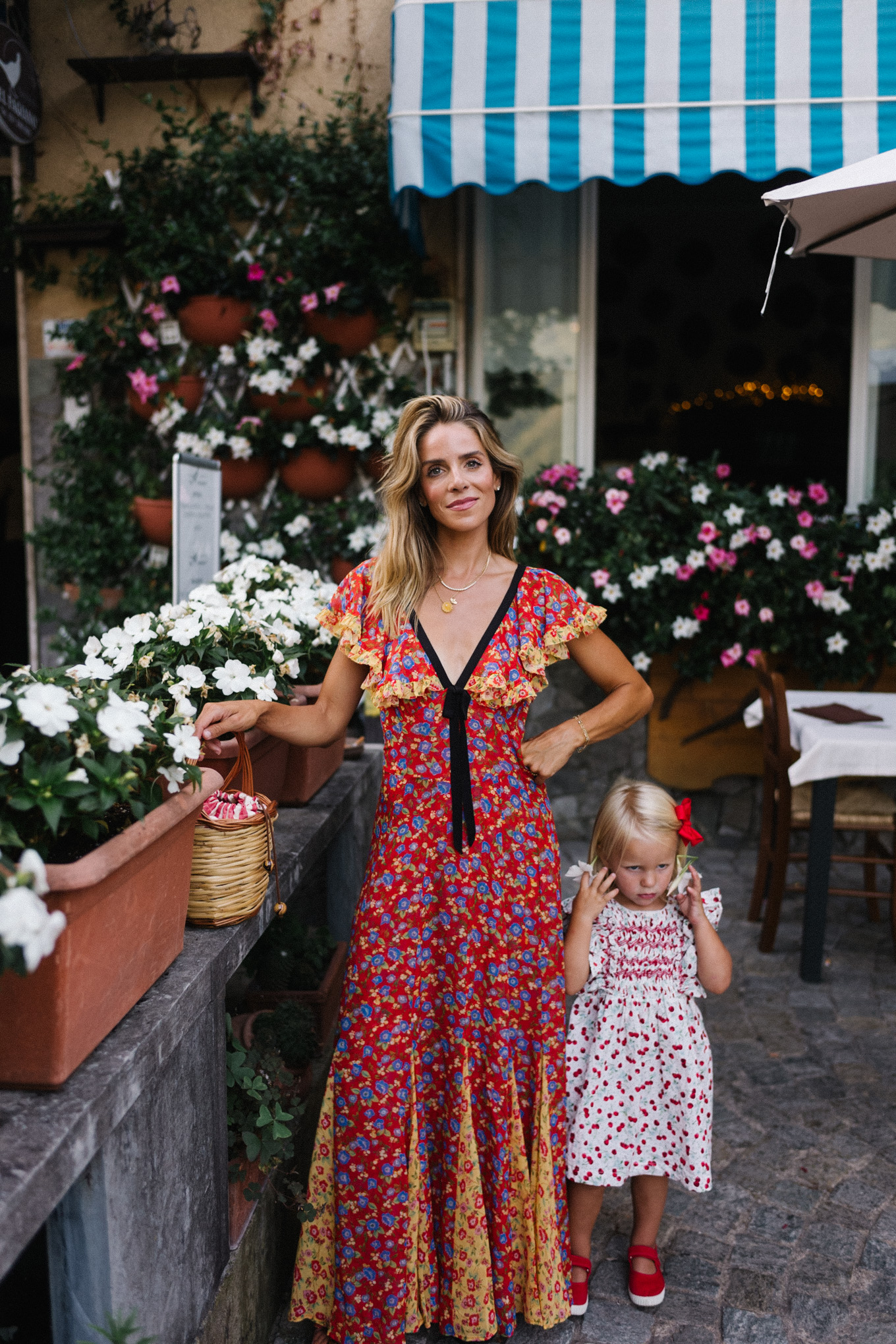 lake como italy red yellow blue floral dress