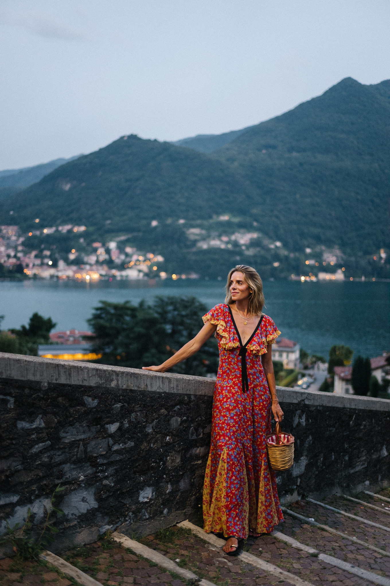 lake como italy red yellow blue floral dress