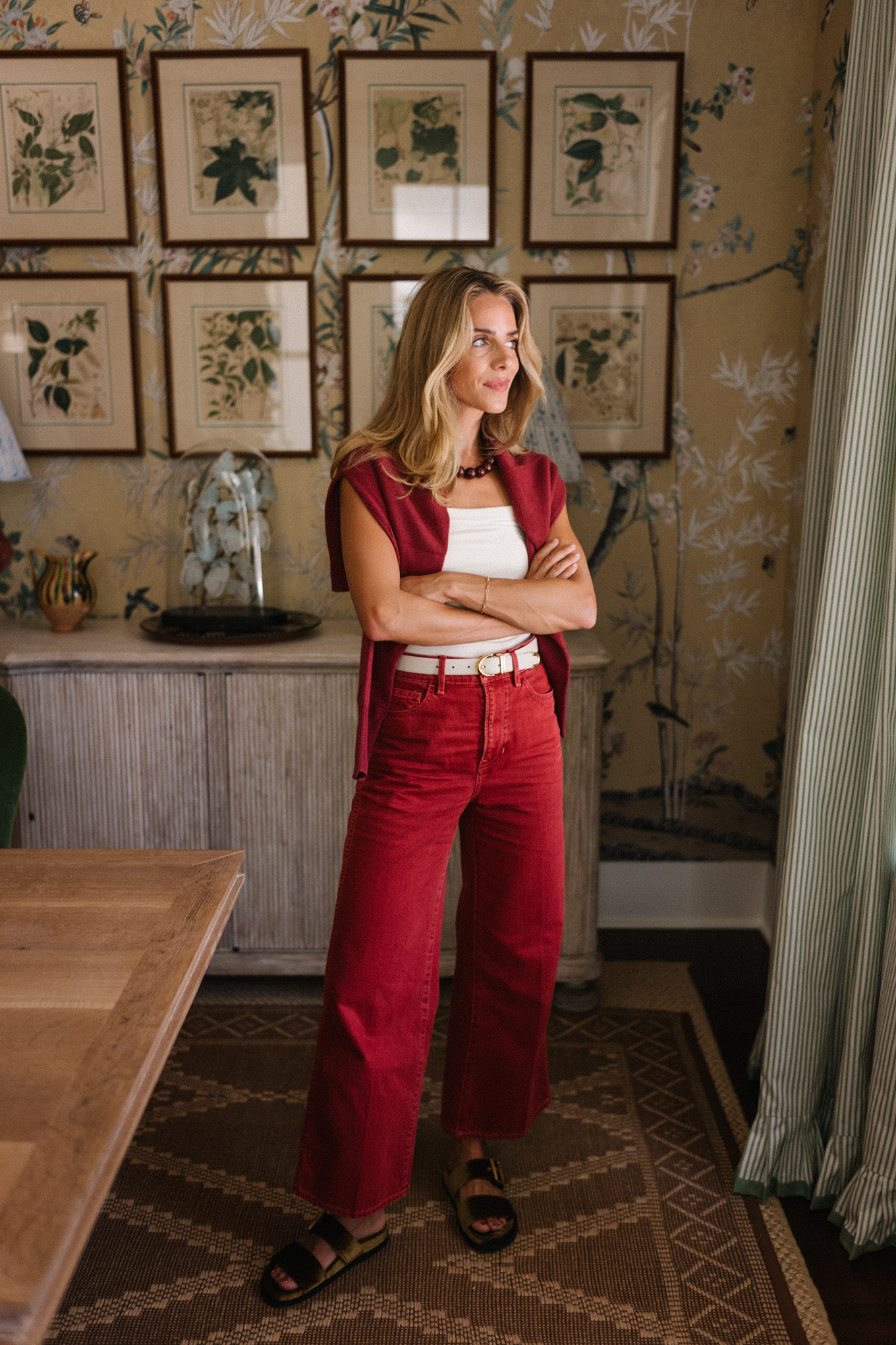 red cashmere sweater white tank red wide leg denim