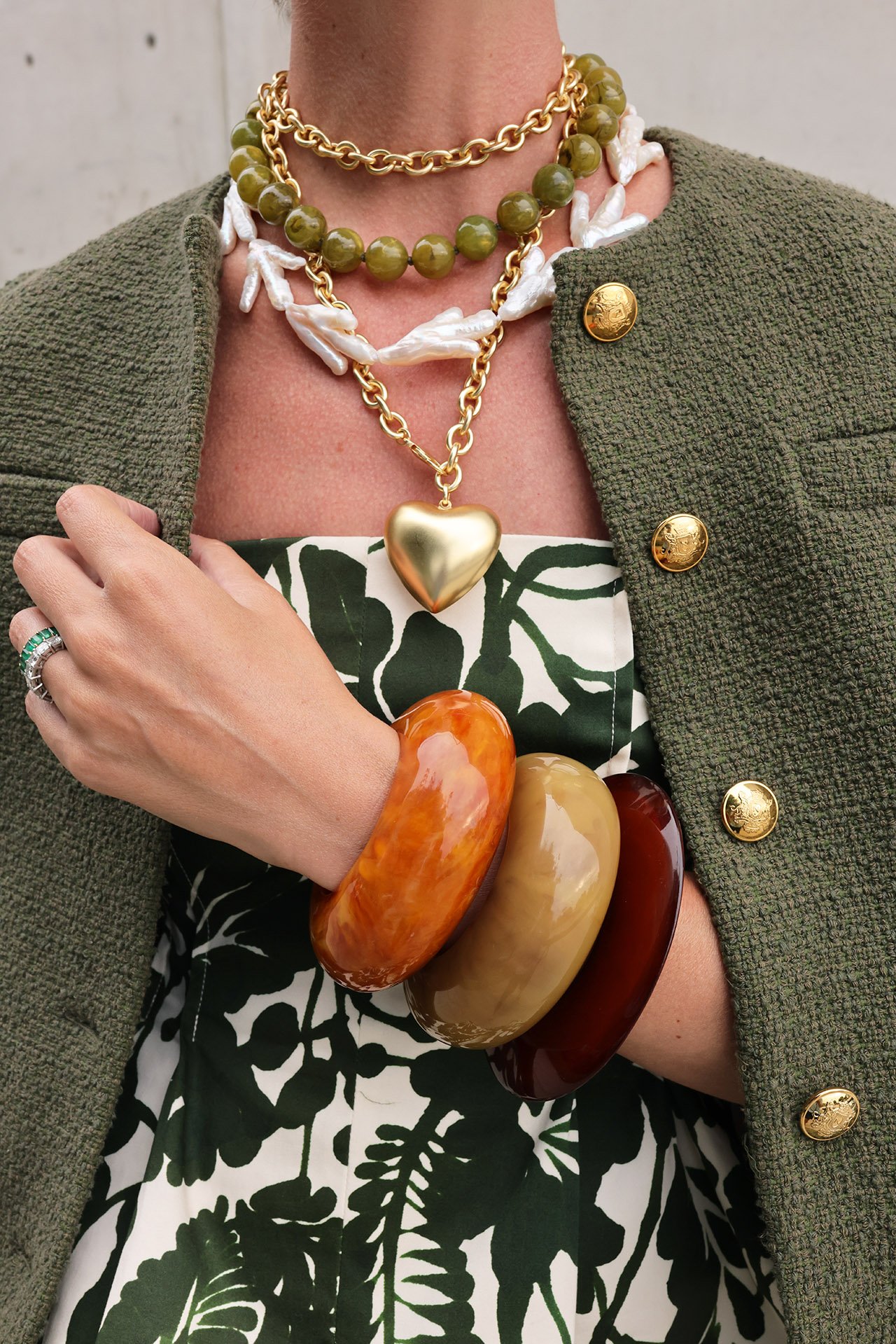 pearl and gold jewelry styling, chunky bangles for fall, heart necklace ideas