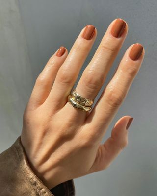 A caramel-colored manicure by Betina Goldstein