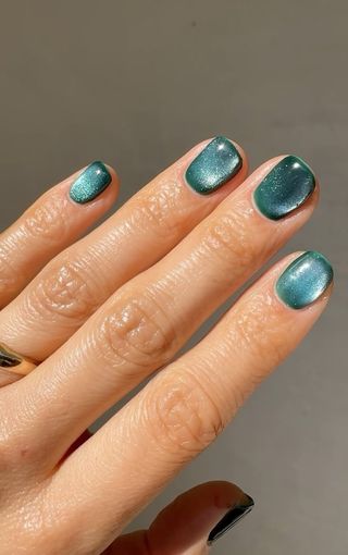 A shimmering, opalescent manicure by Betina Goldstein