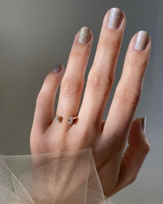 A holographic manicure by Betina Goldstein