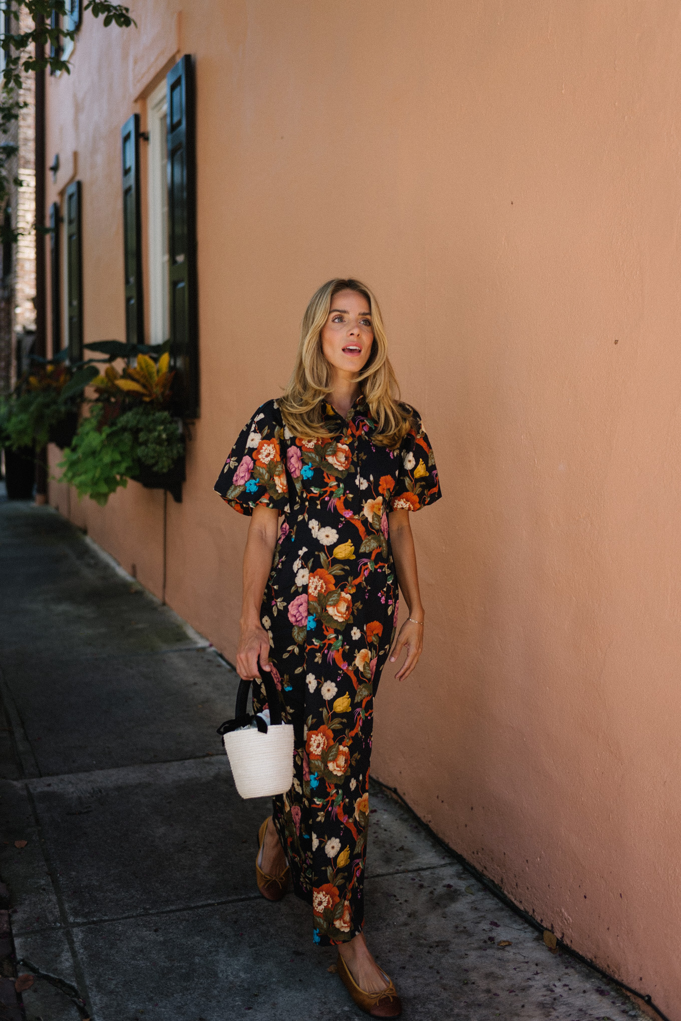 black floral puff sleeve maxi dress raffia bucket bag