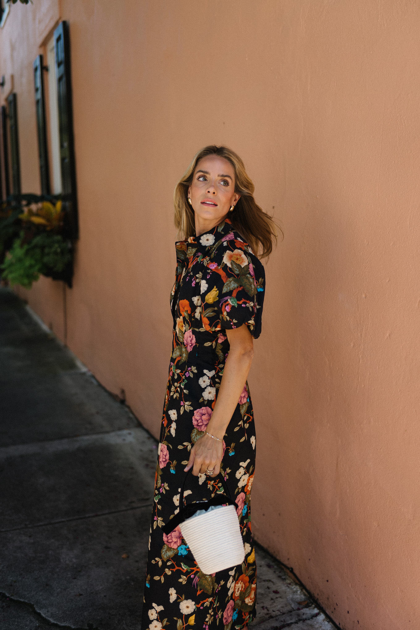 black floral puff sleeve maxi dress raffia bucket bag