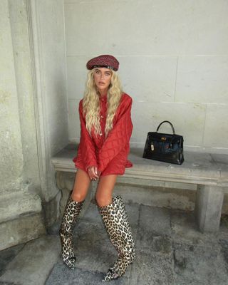 Emili wearing leopard boots