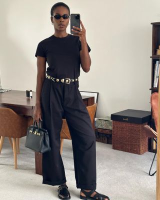 black t-shirt and trousers outfit