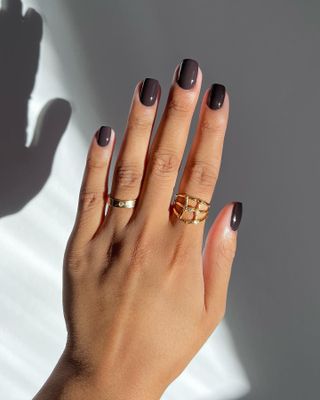 Dark brown nails