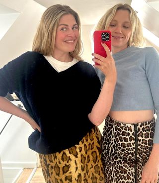 Danish female fashion influencers Sidsel Alling and Pernille Rosenkilde poses for a mirror selfie wearing sweaters and leopard-print skirts