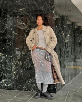 Fashion influencer and stylist Michelle Li wearing chic fall footwear with socks.