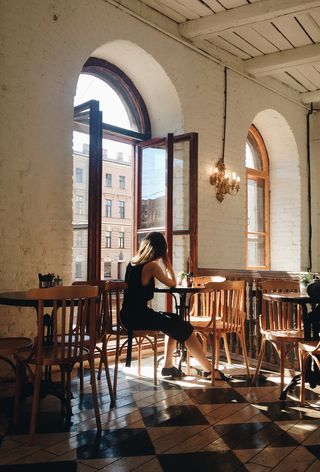 Woman in cafe concentrating