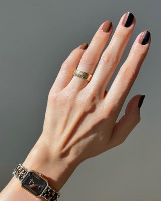 @betina_goldstein brown and black manicure