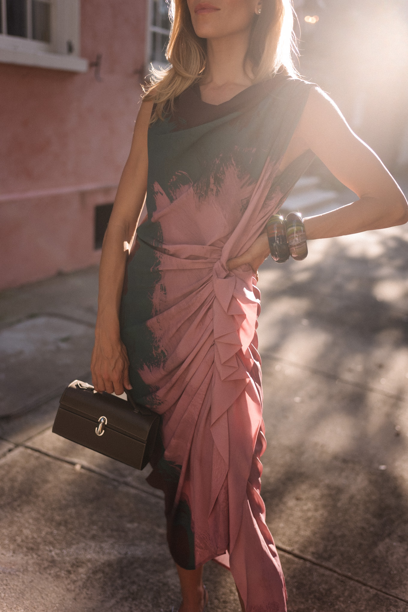 pink teal silk stretch midi dress silver heels leather bag