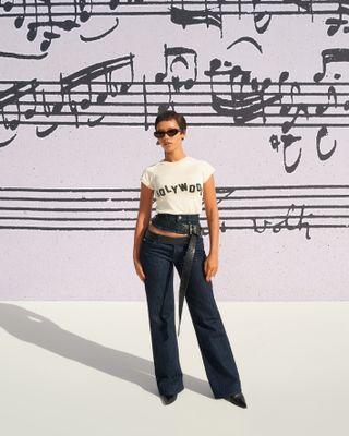 a photo of the celebrity, Taylor Russell, attending Loewe's spring summer 2025 runway show