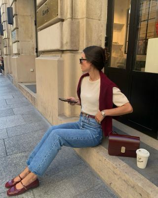 Influencer wears burgundy.