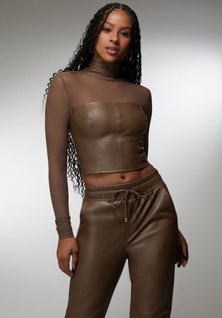 Bebe x Ciara Mock Neck Mesh Combo Vegan Leather Top