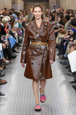 Hilary Swank walking the runway at Miu Miu's Spring/Summer 2025 Paris Fashion Week show.