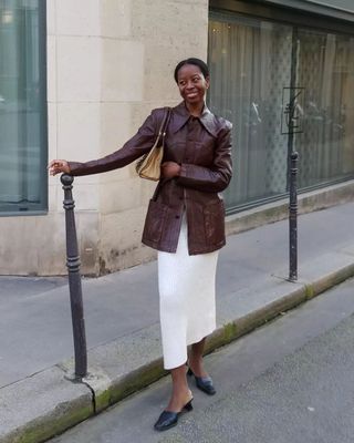 Colours That Go With Burgundy:  @sylviemus_ wears a burgundy leather jacket with a cream skirt