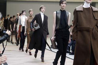 models walk in the runway finale of Celine's fall 2011 collection