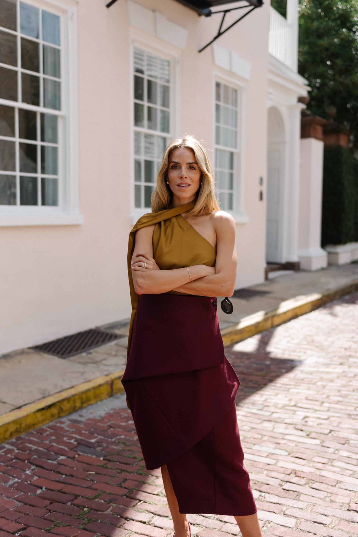 burgundy leather jacket burgundy midi skirt gold silk blouse