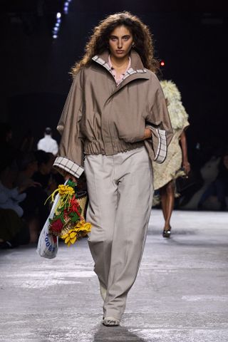 A Bottega Veneta model walks the spring/summer 2025 runway.