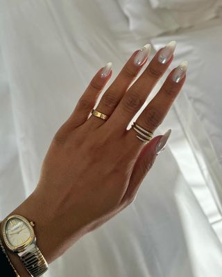 Chrome pearl nails.