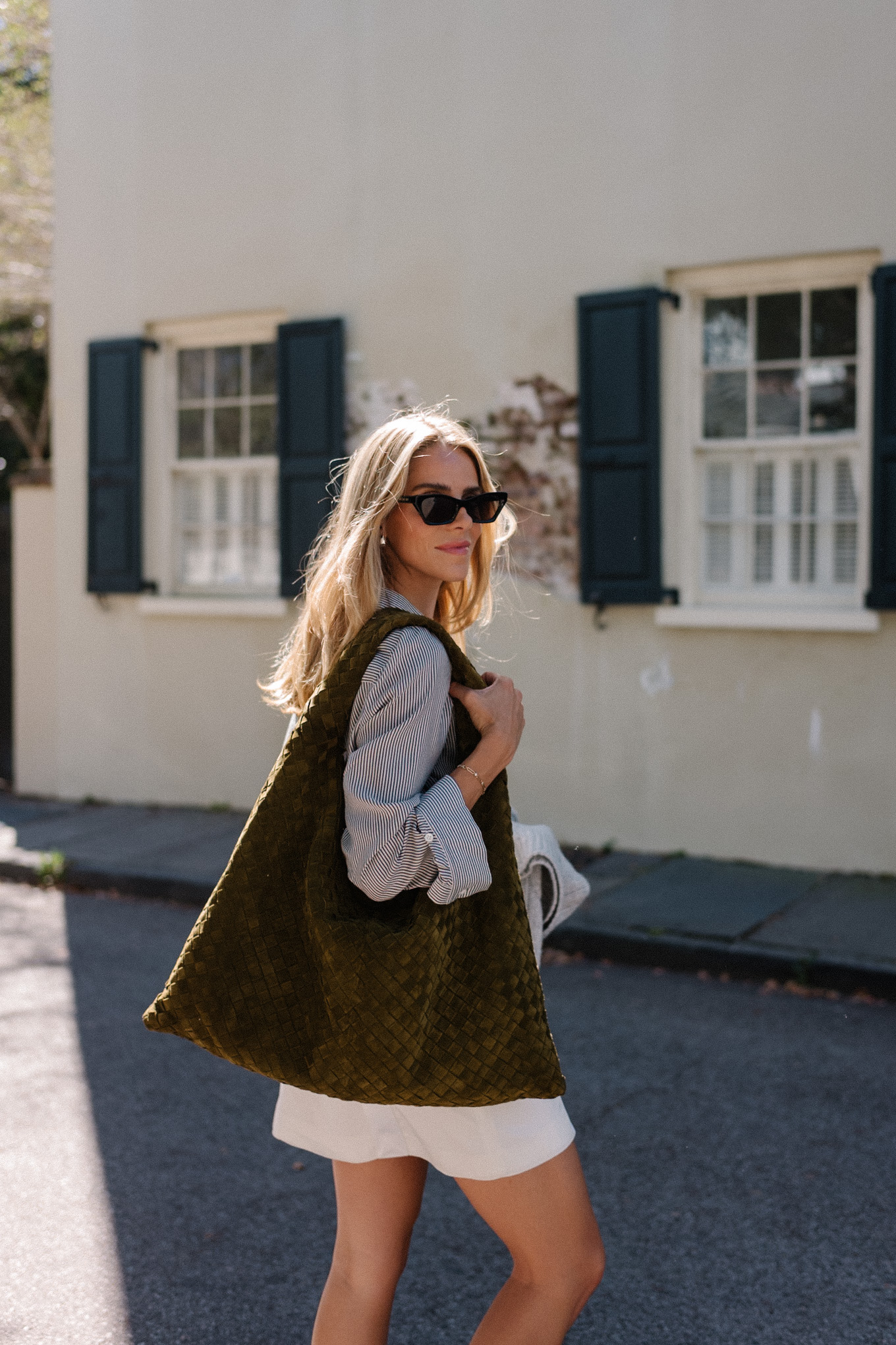 grey sweater striped button down white mini skirt suede hobo bag