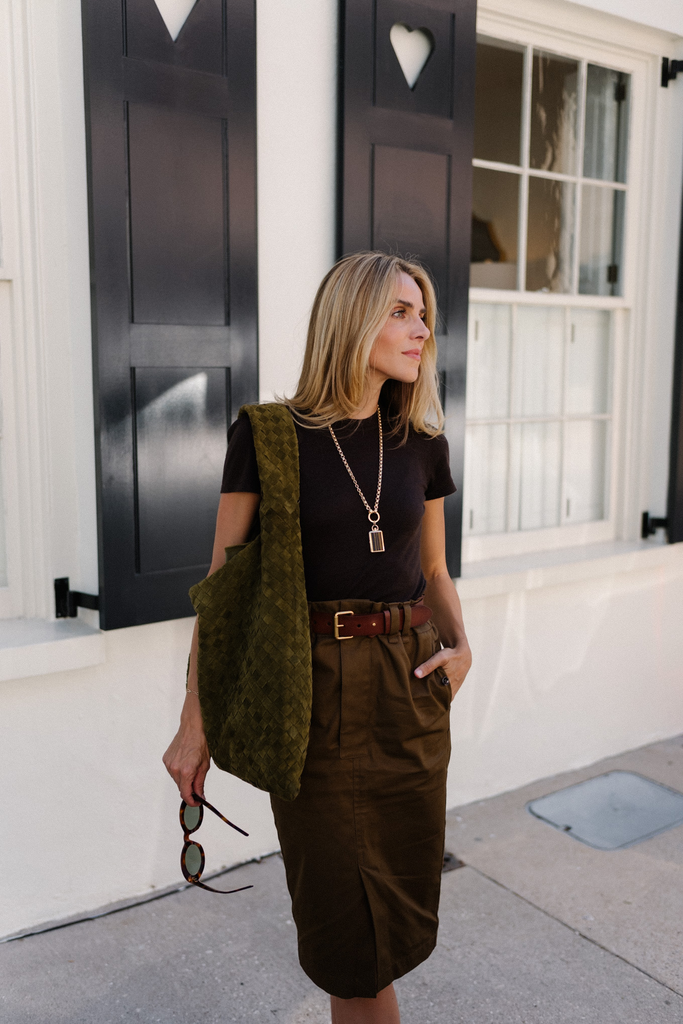 black tee brown belted midi skirt suede hobo bag