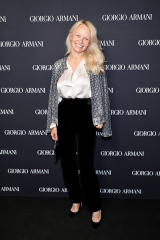 Celebrities at the Giorgio Armani runway show