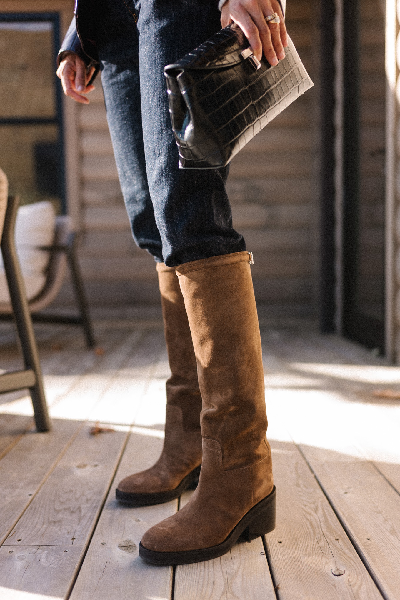 leather jacket grey sweater white button down brown suede boots