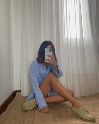 Debora Rosa wearing Clarks Wallabee