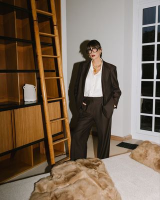 Julie Sergent Ferreri wears a brown suit