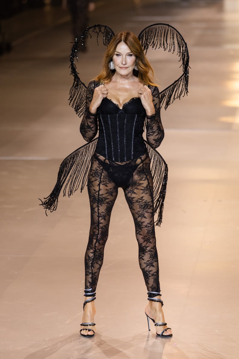 BROOKLYN, NEW YORK - OCTOBER 15: Carla Bruni walks the runway during the Victoria's Secret Fashion Show 2024 at Duggal Greenhouse on October 15, 2024 in Brooklyn, New York. (Photo by TheStewartofNY/FilmMagic)