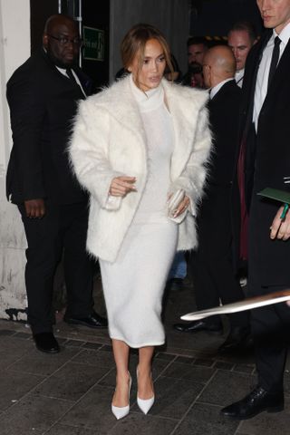 Jennifer Lopez wears a white furry coat