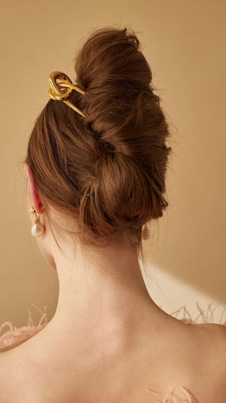 French bun hairstyle with French Pin