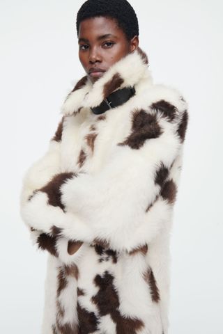 The Funnel-Neck Shearling Coat