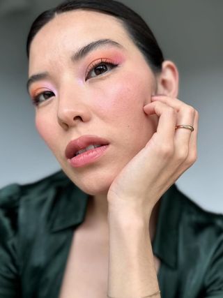 Colorful pink and orange eyeshadow on content creator Marcela Alcala