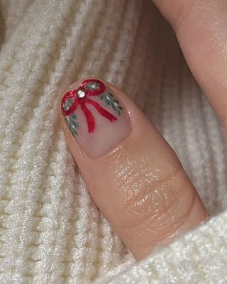 @pink_oblivion bow nail design